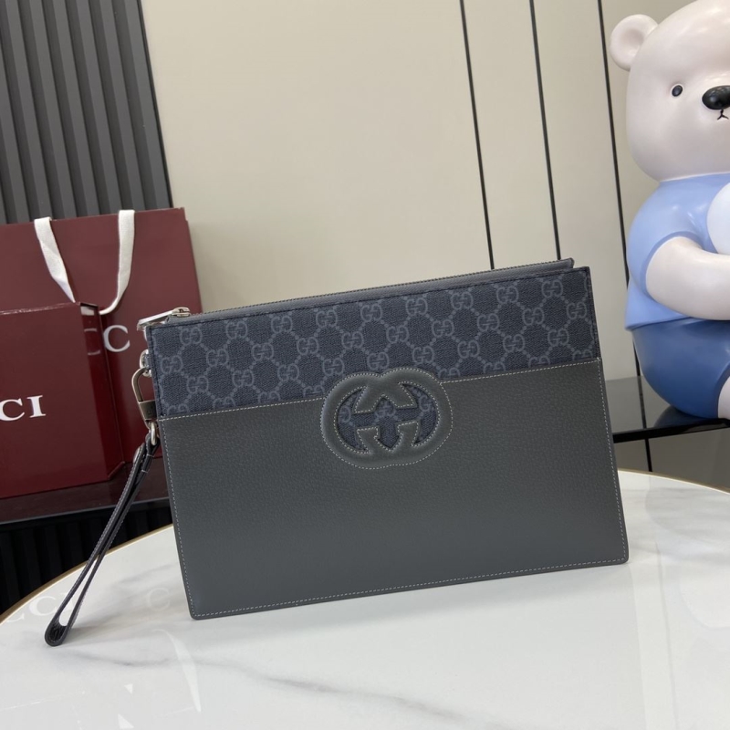 G*u*i clutch bags
